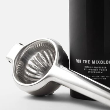 Stylish stainless steel citrus squeezer delivered in cool matte reply packaging